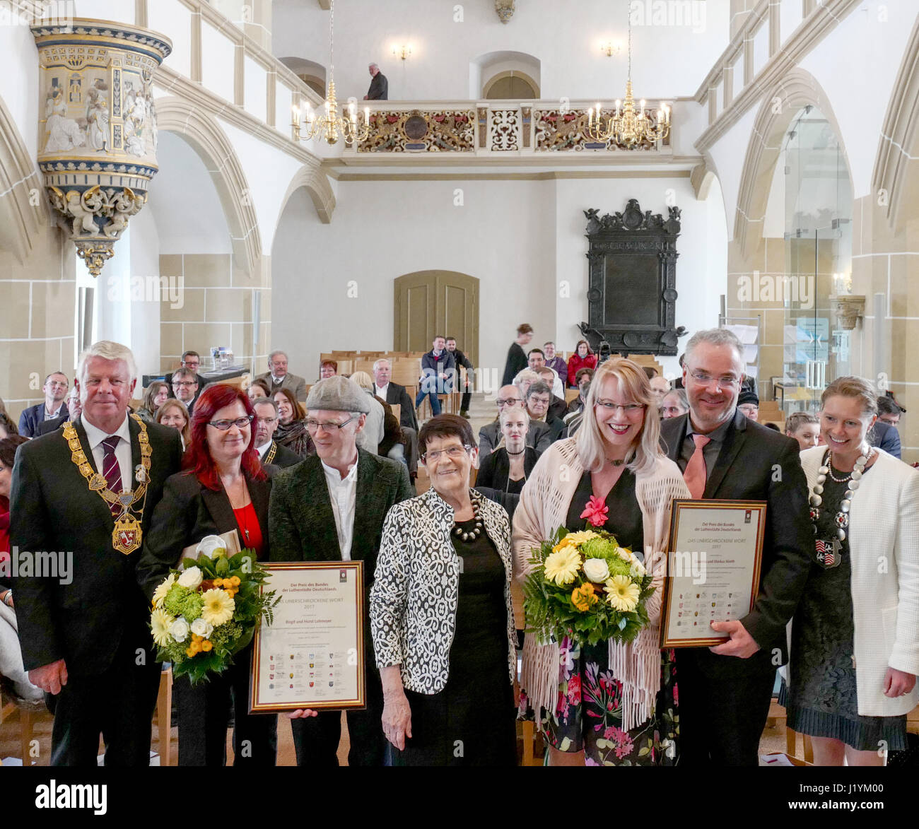 The award winners for the prize 'The unafraid word': the former mayor couple Markus and Susanna Nierth (L) from Troeglitz in Saxony-Anhalt, the artist couple Horst and Birgit Lohmeyer (R) from Jamel stand together with the laudator and former president of the German parliament Rita Suessmuth (M), in the Palace Church at the Palace Hartenfels in Torgau, Germany, 22 April 2017. Also depicted are the mayor of Worms, Michael Kissel (L) and the mayor of Torgau, Romina Barth (R). The prize is awarded every two year and endowed with 10,000 euros. Photo: Peter Endig/dpa-Zentralbild/dpa Stock Photo