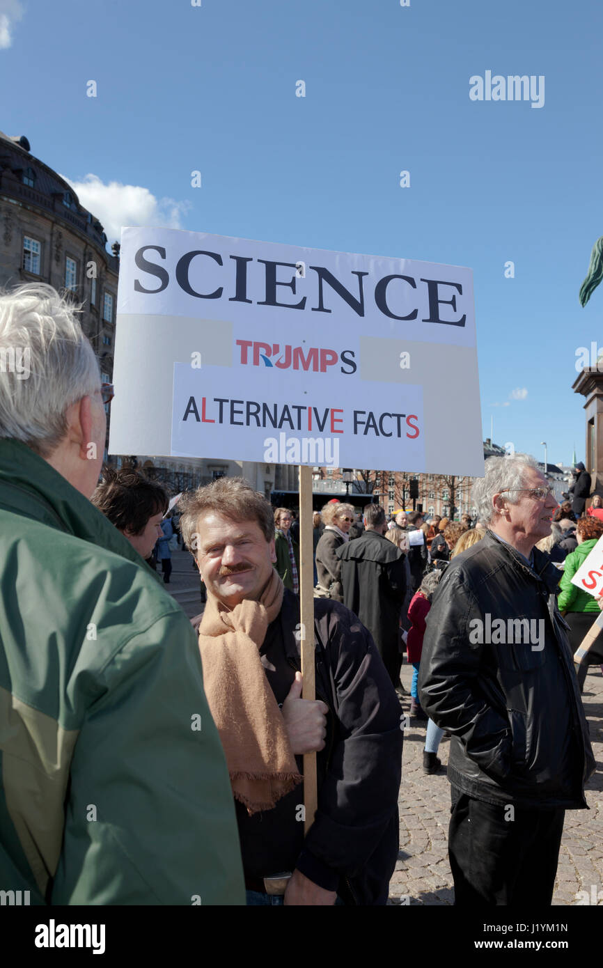 Christiansborg Castle Square, Copenhagen, Denmark. 22nd April, 2017. The participants reach Christiansborg. The March for Science in Copenhagen started at the Niels Bohr Institute and finished at the Danish Parliament nearly two hours later to be followed by two hours of enlightenment, speeches and entertainment. Thousands of scientists, science enthusiasts and concerned people participated to emphasize the necessity of education, scientific knowledge and research and the need of policies based on scientific evidence avoiding the tendency to pseudo-science. Credit Niels Quist / Alamy Live News Stock Photo