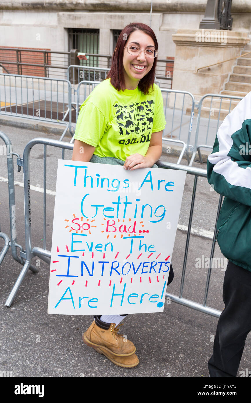 New York, USA. 22nd April, 2017. An unidentified woman holds a sign that reads 'Things Are Getting So Bad Even the Introverts Are Here' during the March For Science on April 22, 2017 in New York. Credit: Justin Starr/Alamy Live News Stock Photo