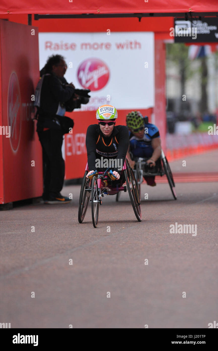 London, UK. 23rd April, 2017. Amanda McGrory (USA) crossing the finish line in second place in the Women's Virgin Money London Marathon Wheelchair Elite race.  McGrory was beaten by Manuela Schar (SUI)  who came first and followed by Susannah Scaroni (USA) in third place. Credit: Michael Preston/Alamy Live News Stock Photo