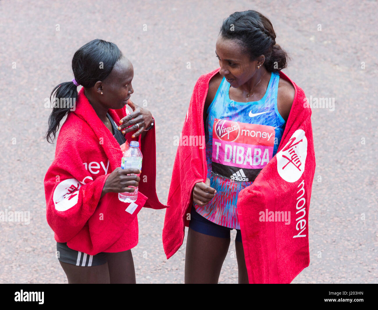 London, UK. 23rd Apr, 2017. Winner Mary Keitany (KEN) with second placed Tirunesh Dibaba (ETH). The 37th London Marathon finishes on the Mall. Credit: Bettina Strenske/Alamy Live News Stock Photo