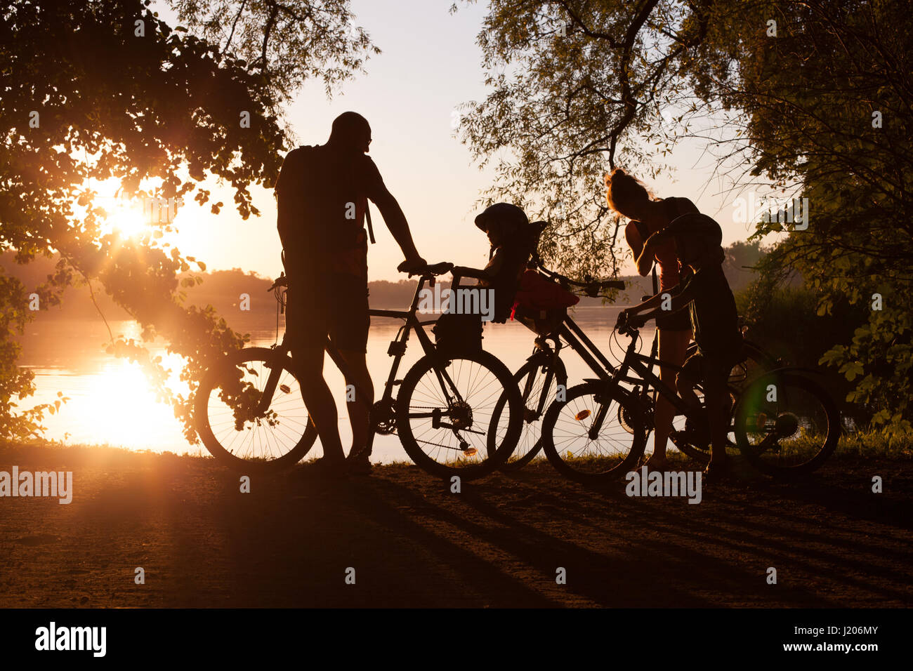 Family on bikes - lifestyle Stock Photo