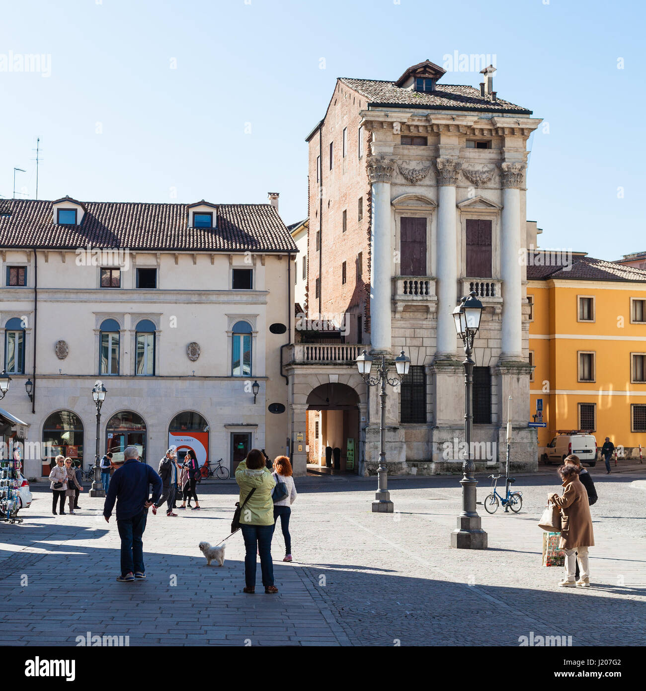 VICENZA, ITALY - MARCH 28, 2017: people near Palazzo Porto on Piazza del Castello in Vicenza in spring. The city of Palladio has been listed as an UNE Stock Photo