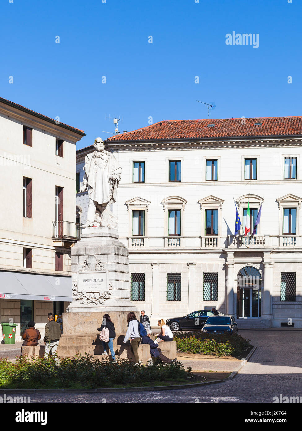 VICENZA, ITALY - MARCH 28, 2017: people near Monument Giuseppe Garibaldi on Piazza del Castello in Vicenza in spring. The city of Palladio has been li Stock Photo