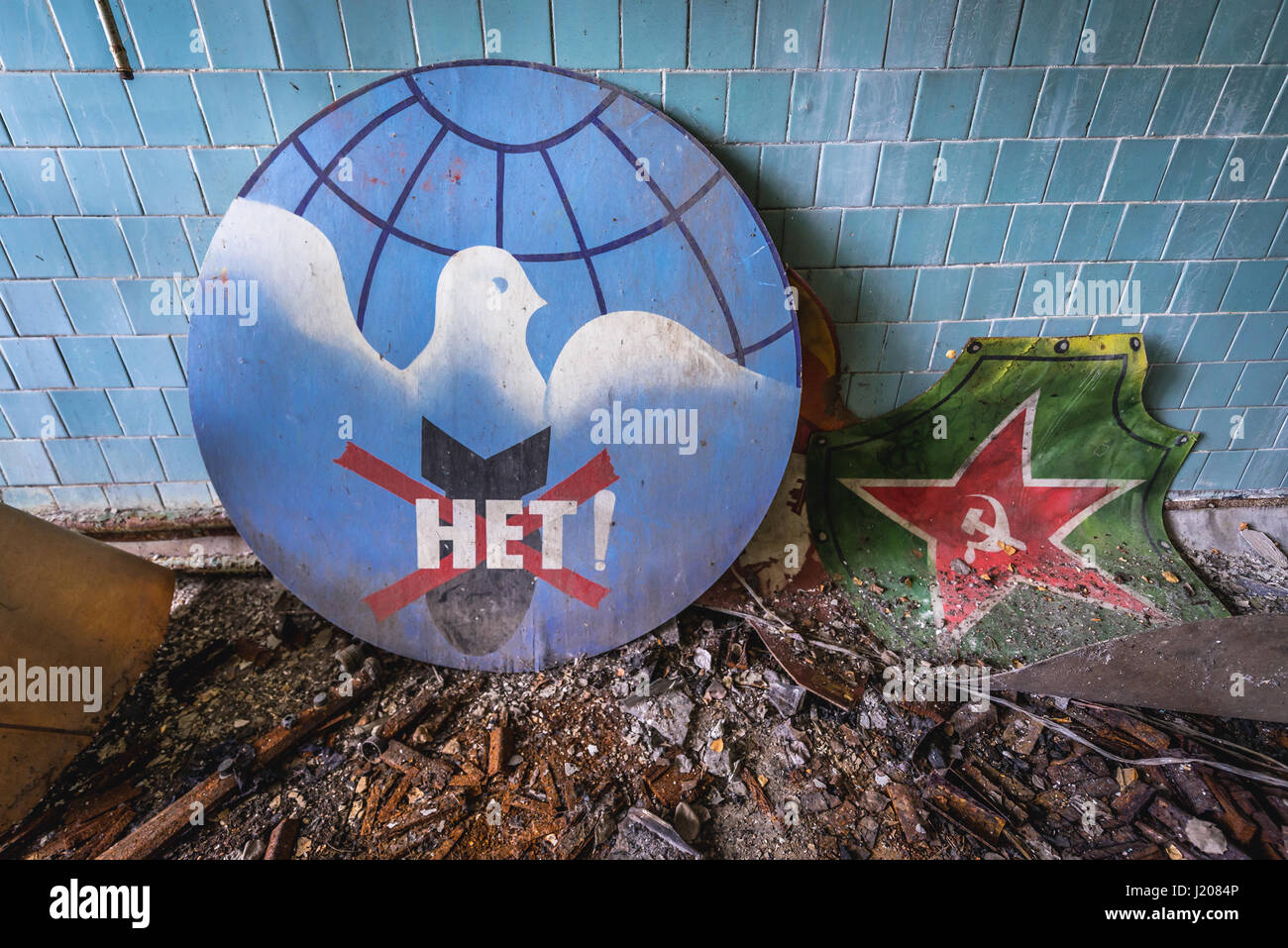 Old Soviet peace sign with 'no' word on a bomb in abandoned Jupiter Factory in Pripyat city of Chernobyl Zone of Alienation in Ukraine Stock Photo