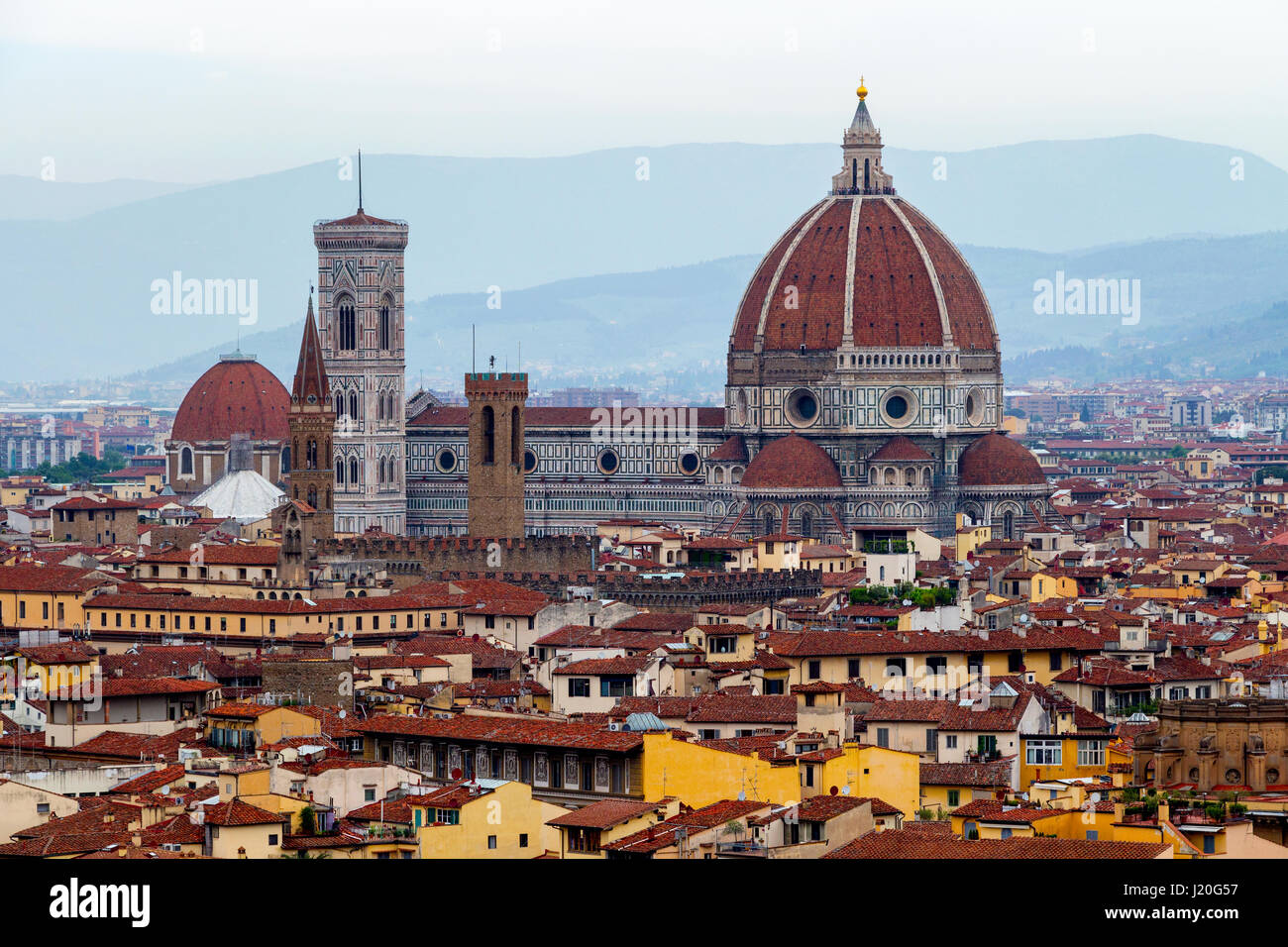 Florence, Italy. The Florence Dome under a foggy sky at sunset. Stock Photo