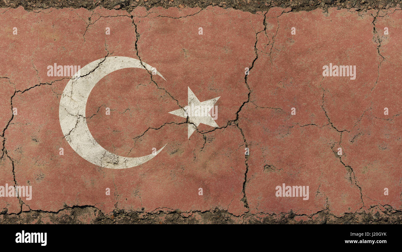 Old grunge vintage dirty faded shabby distressed Turkish or Republic of Turkey flag background on broken concrete wall with cracks Stock Photo