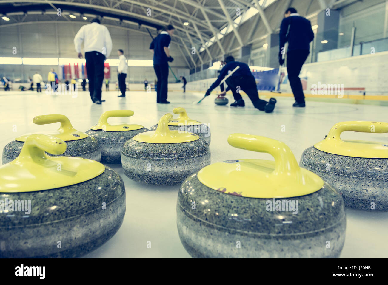 Curling stone on a game sheet. Indoor sport on ice Stock Photo Alamy