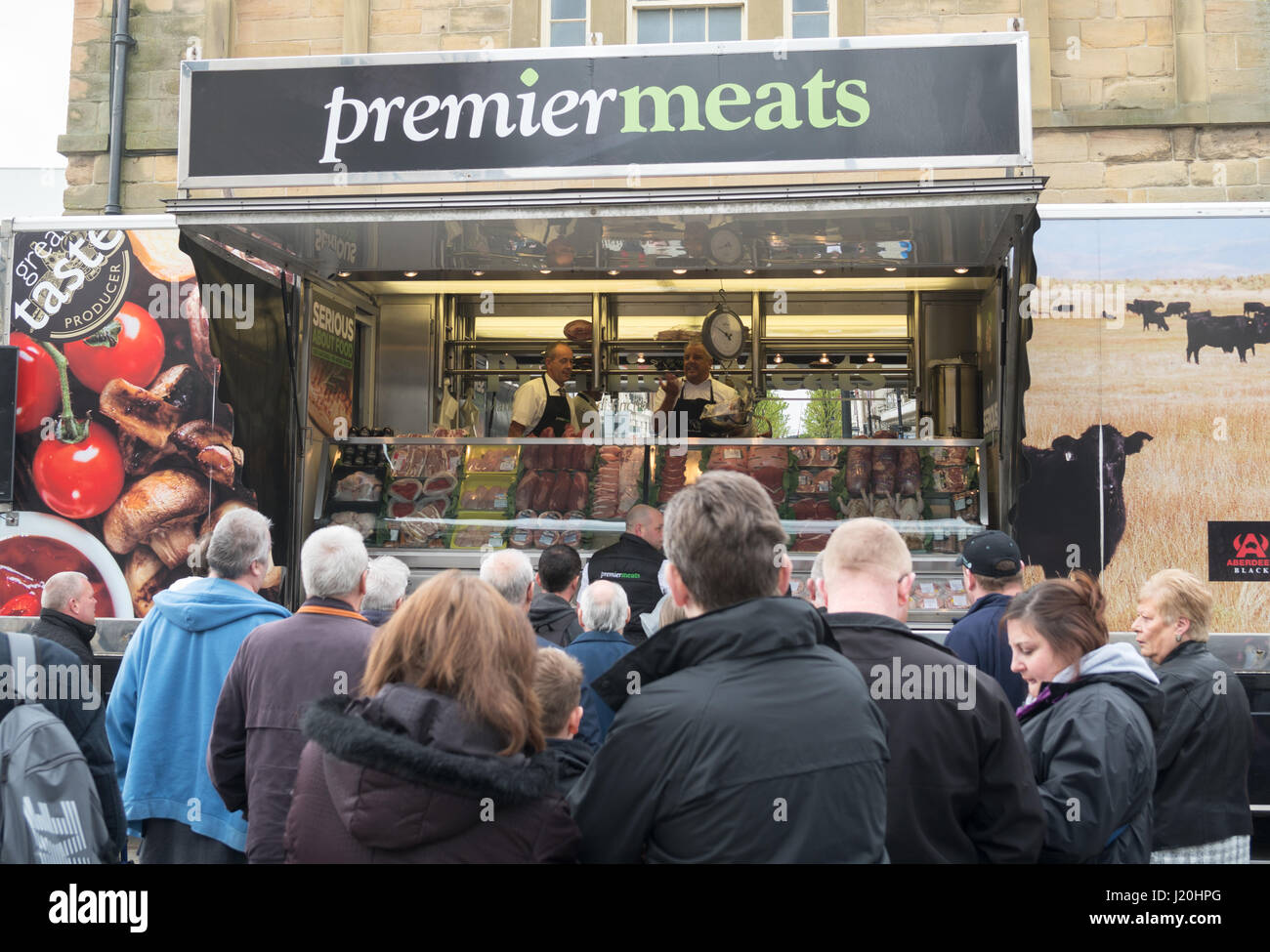 Premier Meats market trader South Shields Market Square, north east England, UK Stock Photo