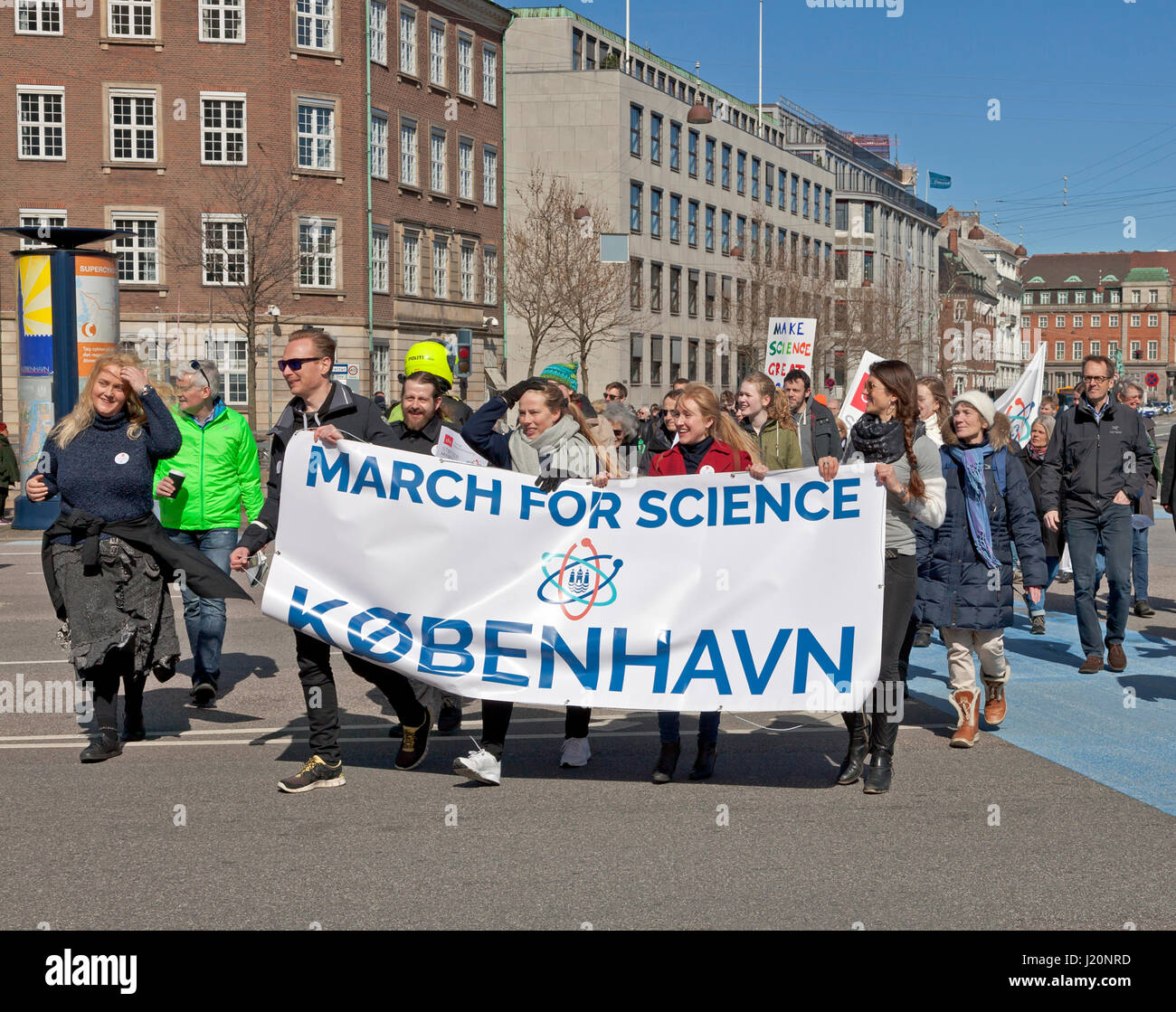 The March for Science in Copenhagen arrives at Christiansborg Castle Square after a two hours march through Copenhagen from the Niels Bohr Institute. Stock Photo