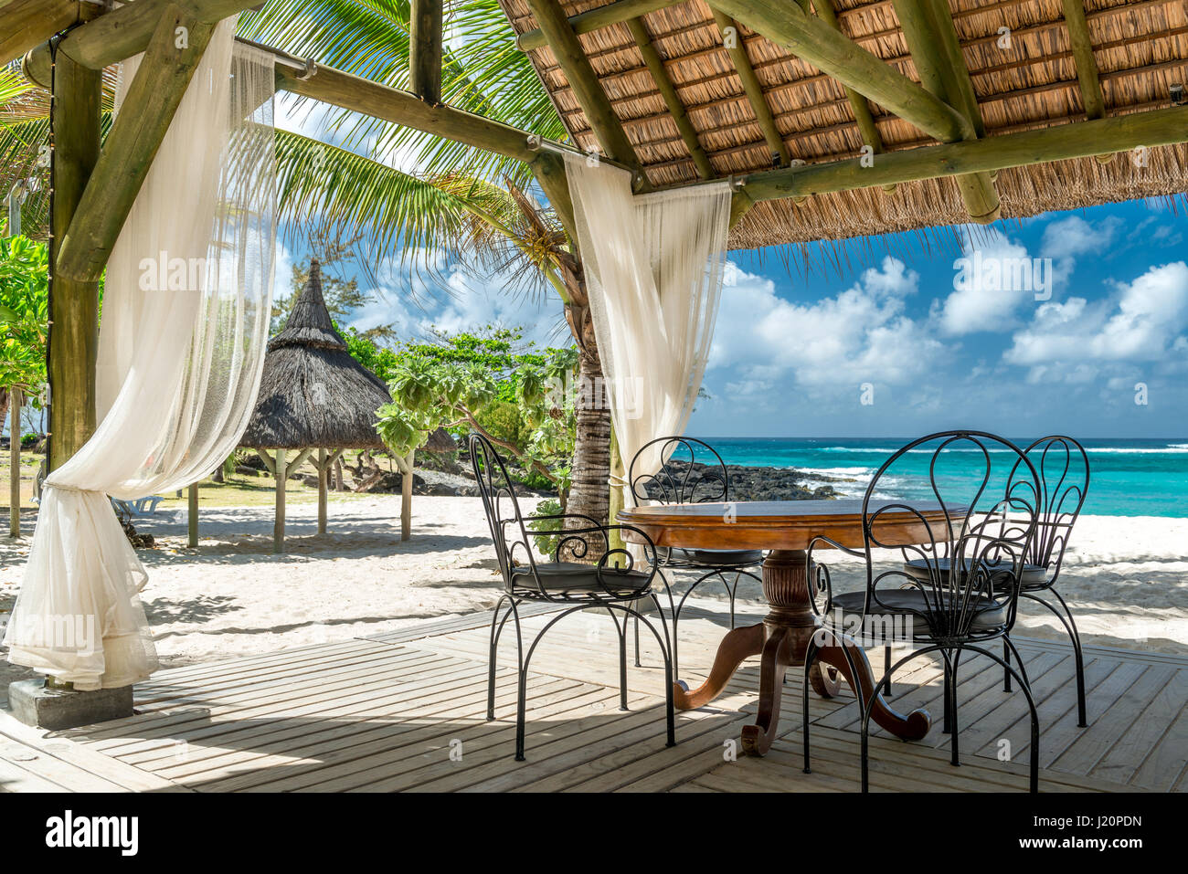 beautiful beach lounge on a coastline in mauritius Stock Photo