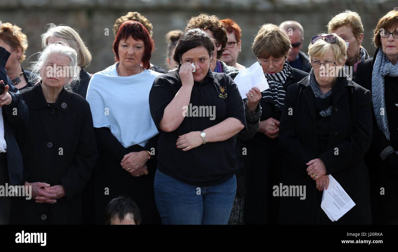 Crowds during a wreath laying ceremony for the crew of the Irish Coast Guard helicopter crash Rescue 116 at the helipad in Blacksod Harbour, as scores of divers have been taking part in renewed efforts to find the bodies of two winchmen from the Irish Coast Guard helicopter which crashed in the Atlantic last month. Stock Photo