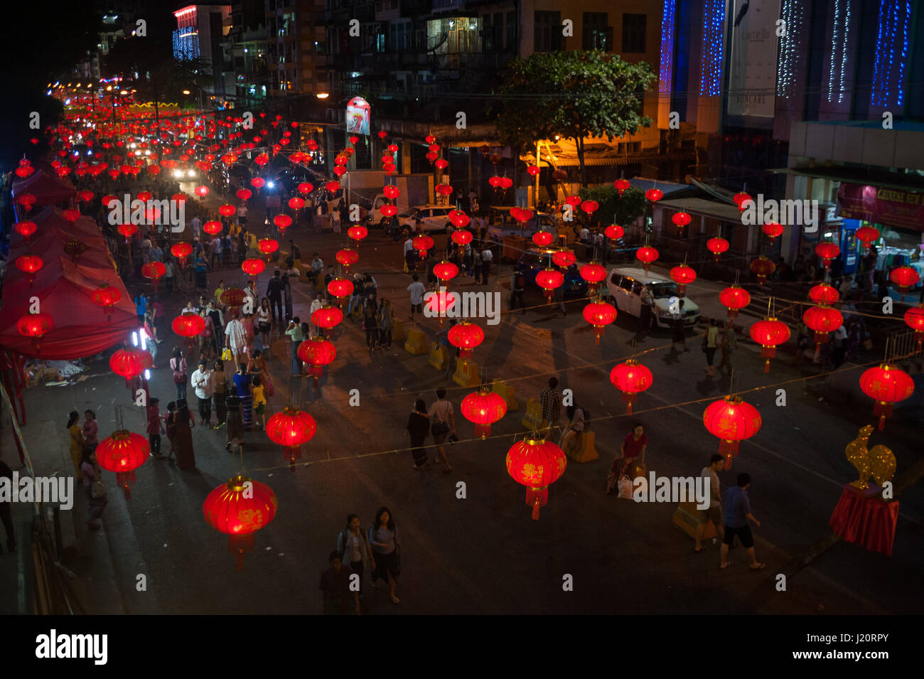 27.01.2017, Yangon, Republic of the Union of Myanmar, Asia - Lanterns are seen hanging above a street in Chinatown. Stock Photo