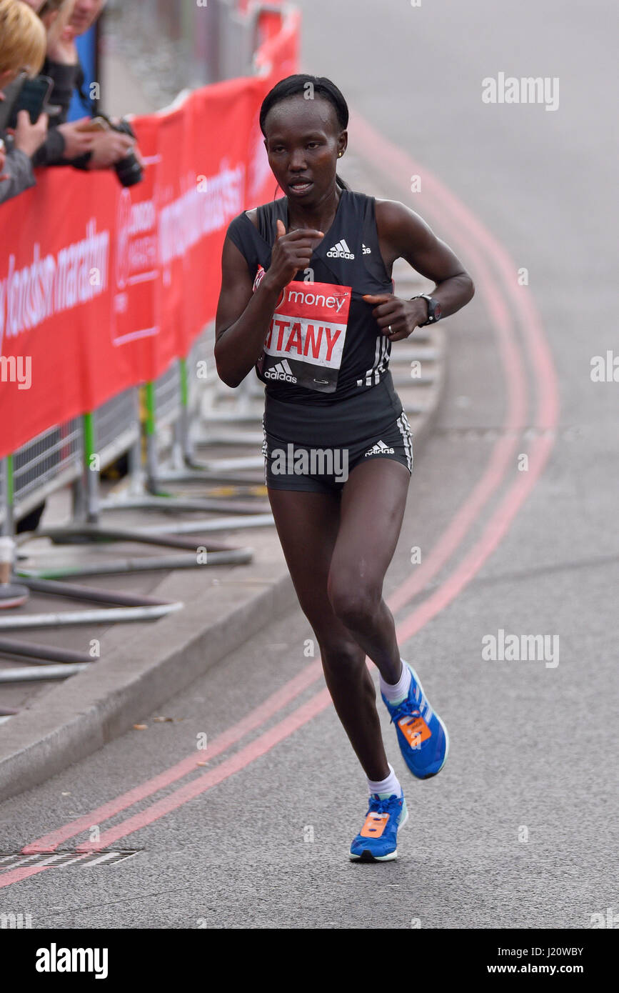 Mary Keitany at the 2017 Virgin London Marathon after crossing Tower Bridge and alongside the Tower of London. Winner Stock Photo