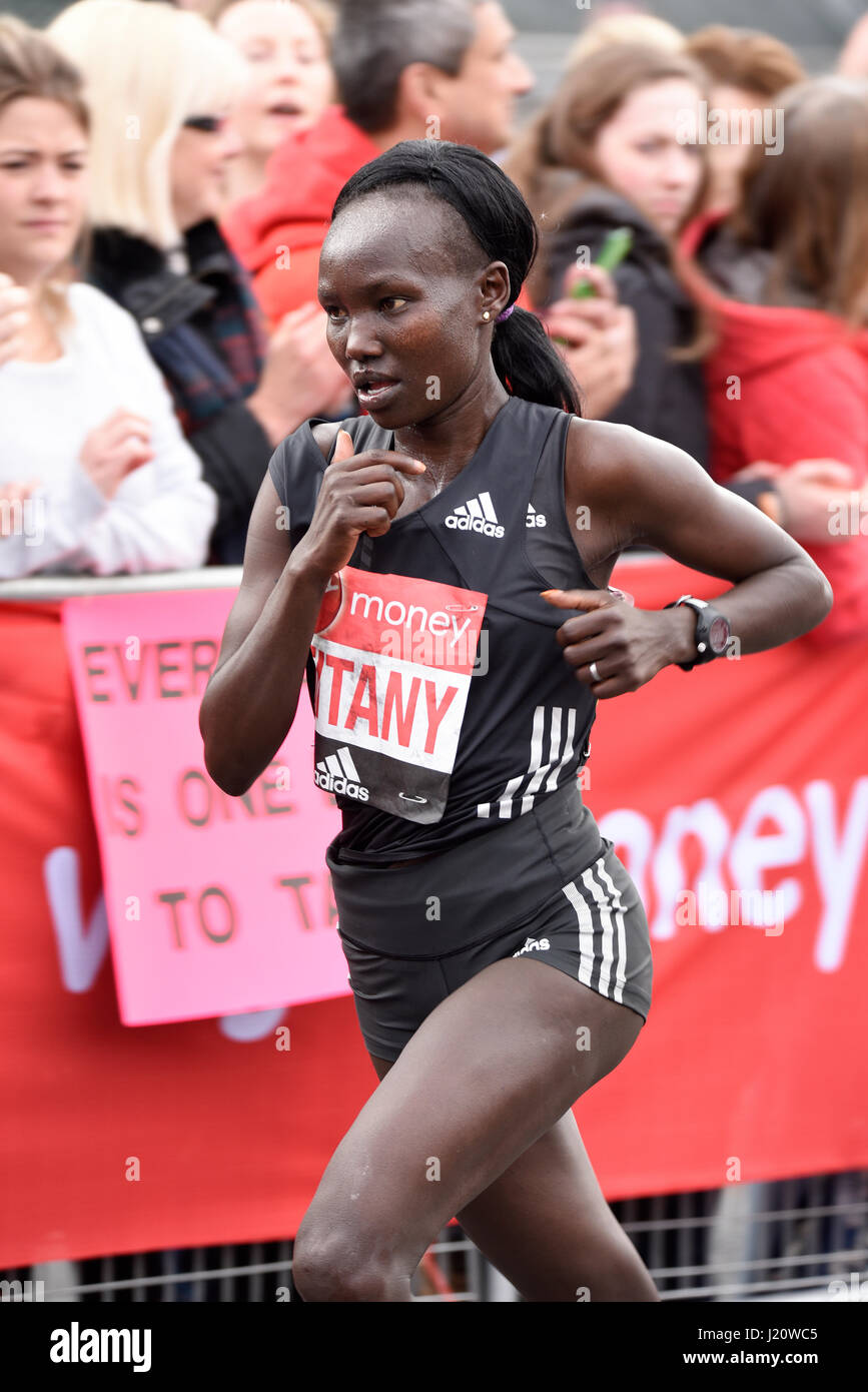 Mary Keitany at the 2017 Virgin London Marathon after crossing Tower Bridge and alongside the Tower of London. Winner Stock Photo