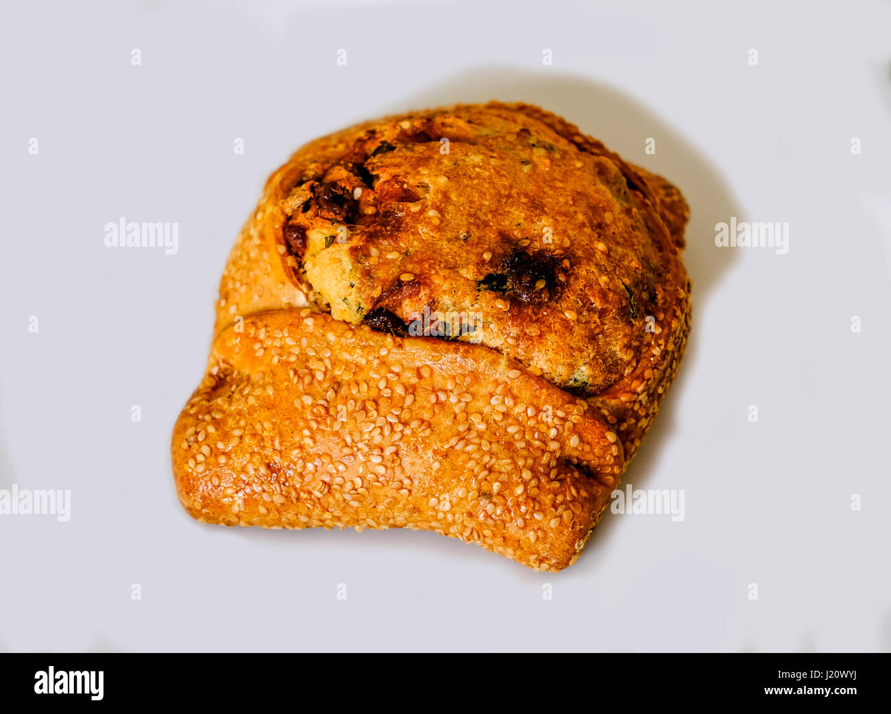 Flaouna, Greek Easter Cake from Cyprus on a white background. Stock Photo