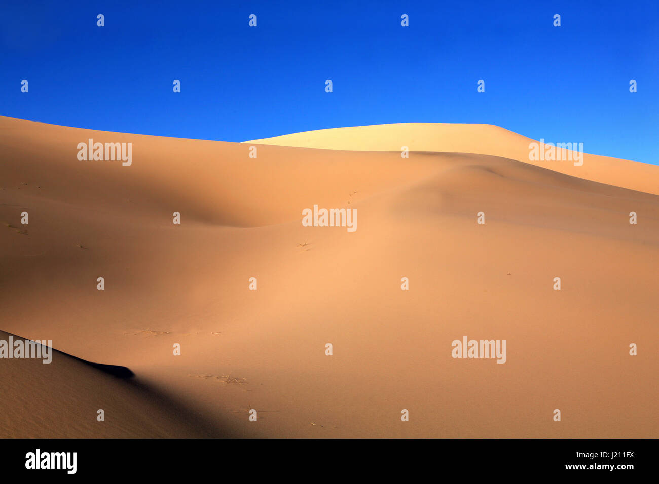 Light and shade on sand dunes in Gobi Desert Khongoryn Els Gurvan Saikhan National Park Mongolia Stock Photo