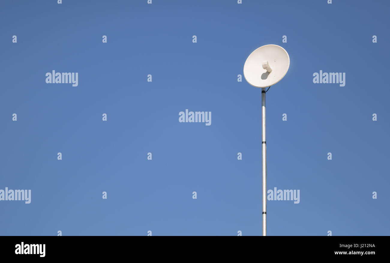 Modern outdoor wifi antenna installed to provide access Stock