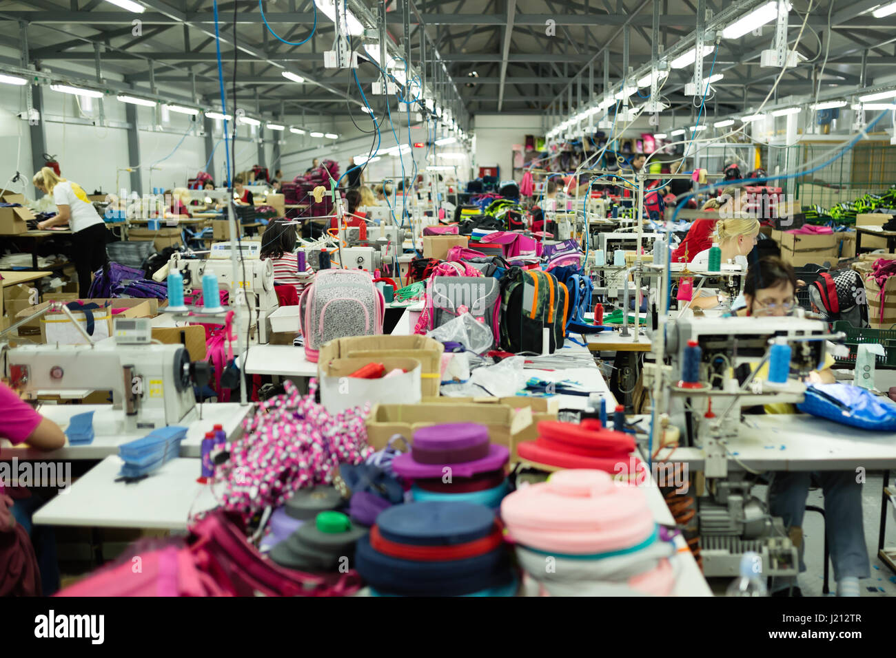 Industrial busy sewing workplace Stock Photo