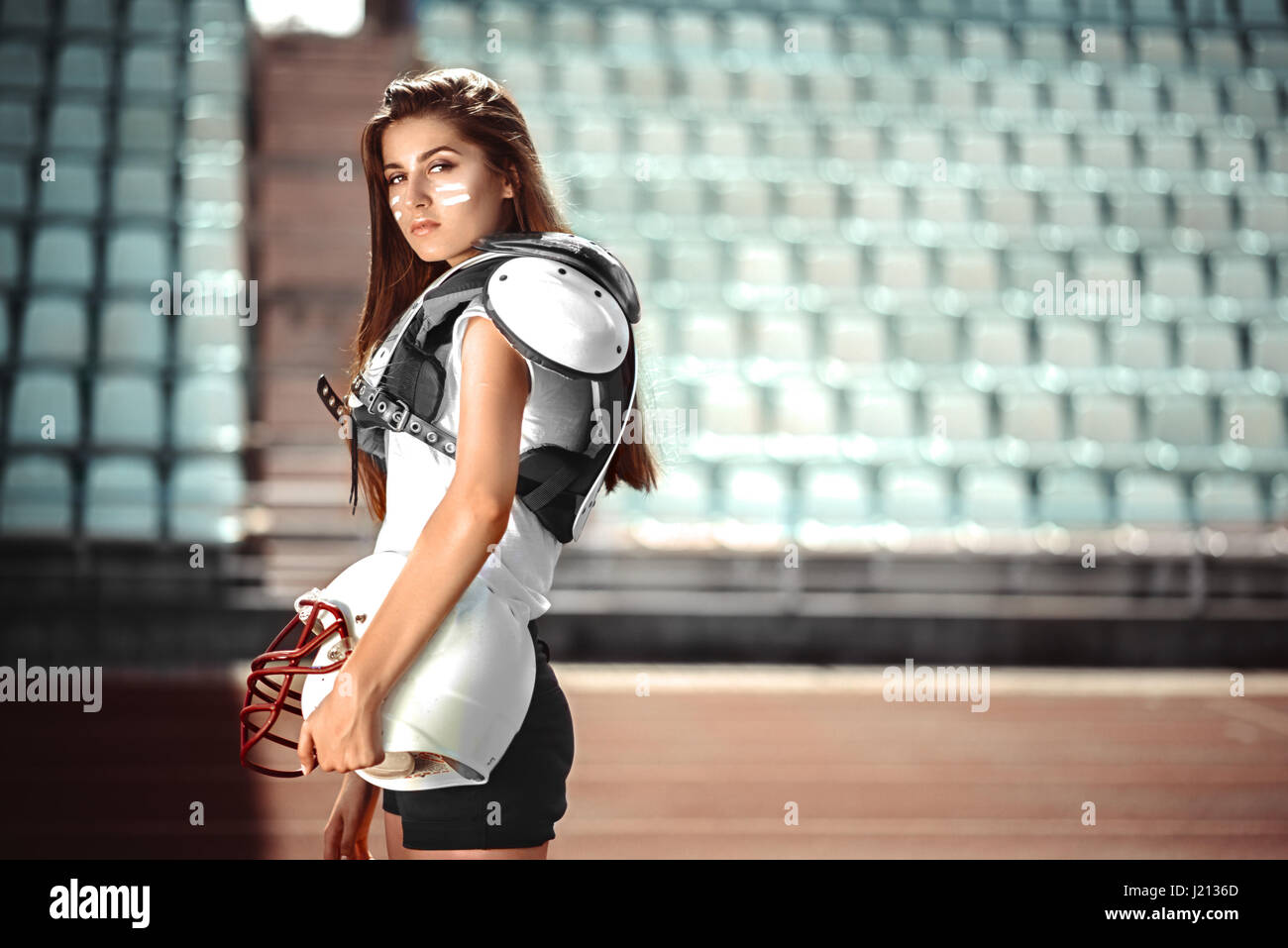 Rugby girl player stay with ball on stadion. Sport. Life Stock Photo
