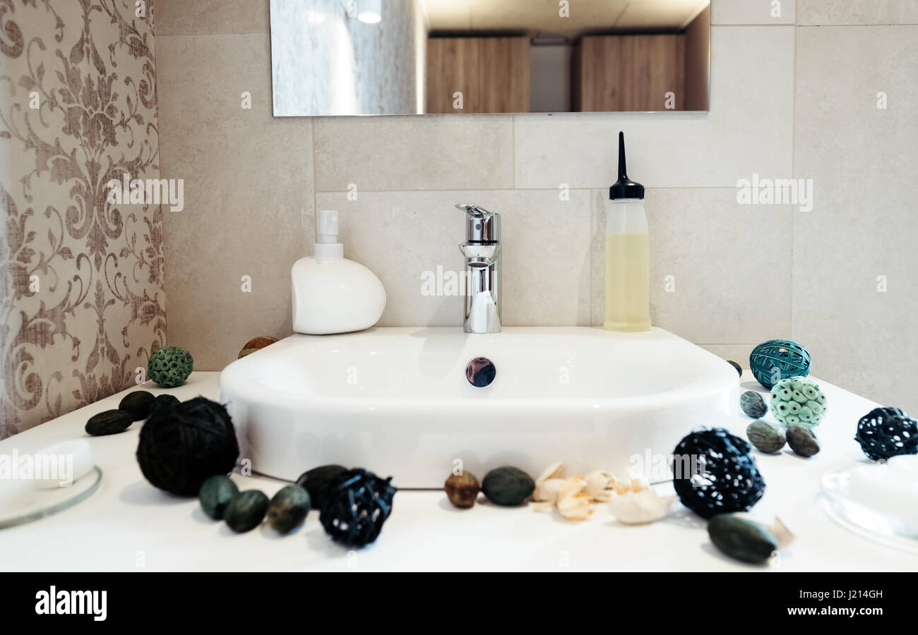 Decorated sink in bathroom and soap with stones Stock Photo Alamy