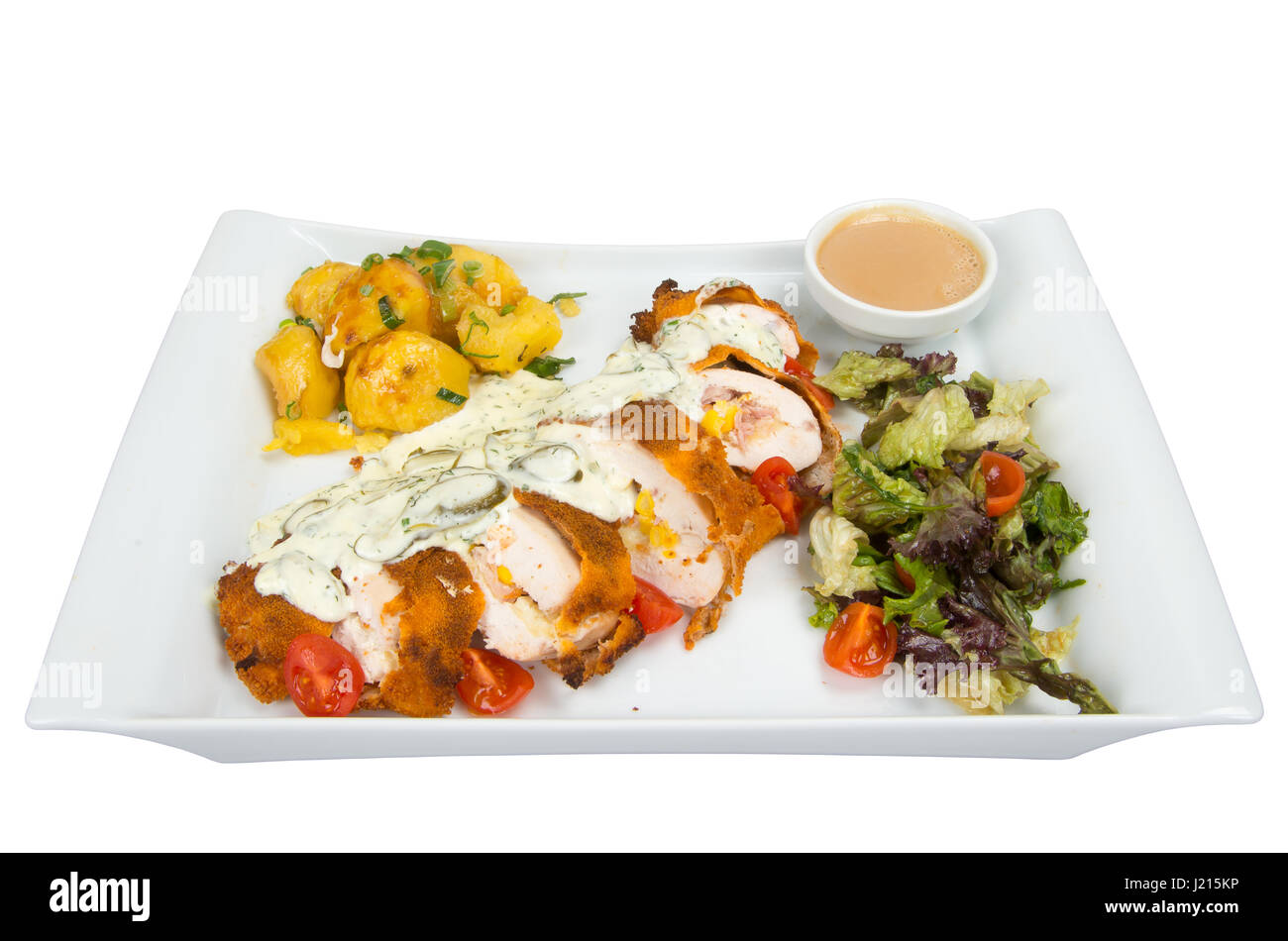 Breaded roll of chicken with sauce Stock Photo Alamy