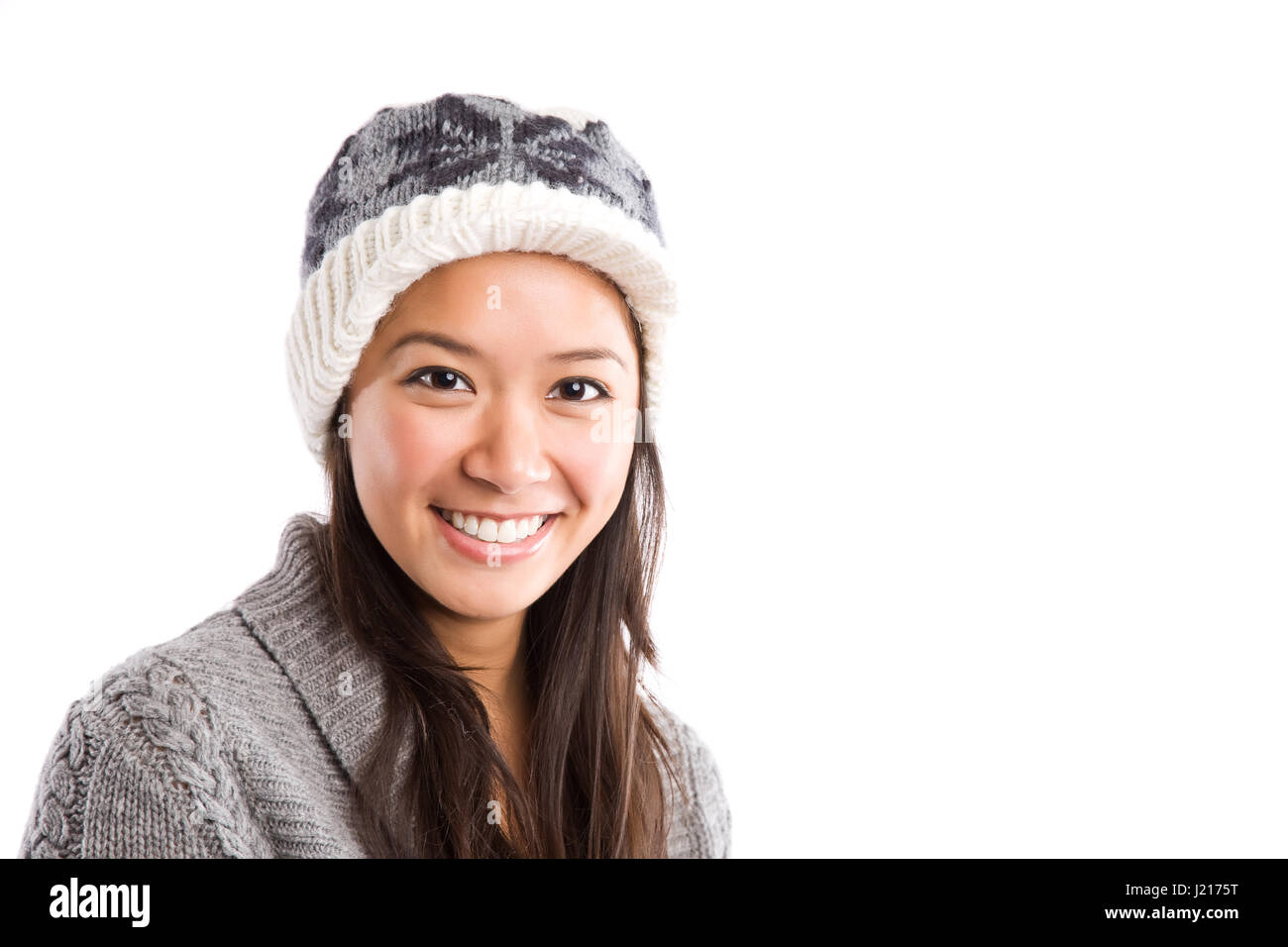 A shot of a happy beautiful asian woman in winter outfit Stock Photo