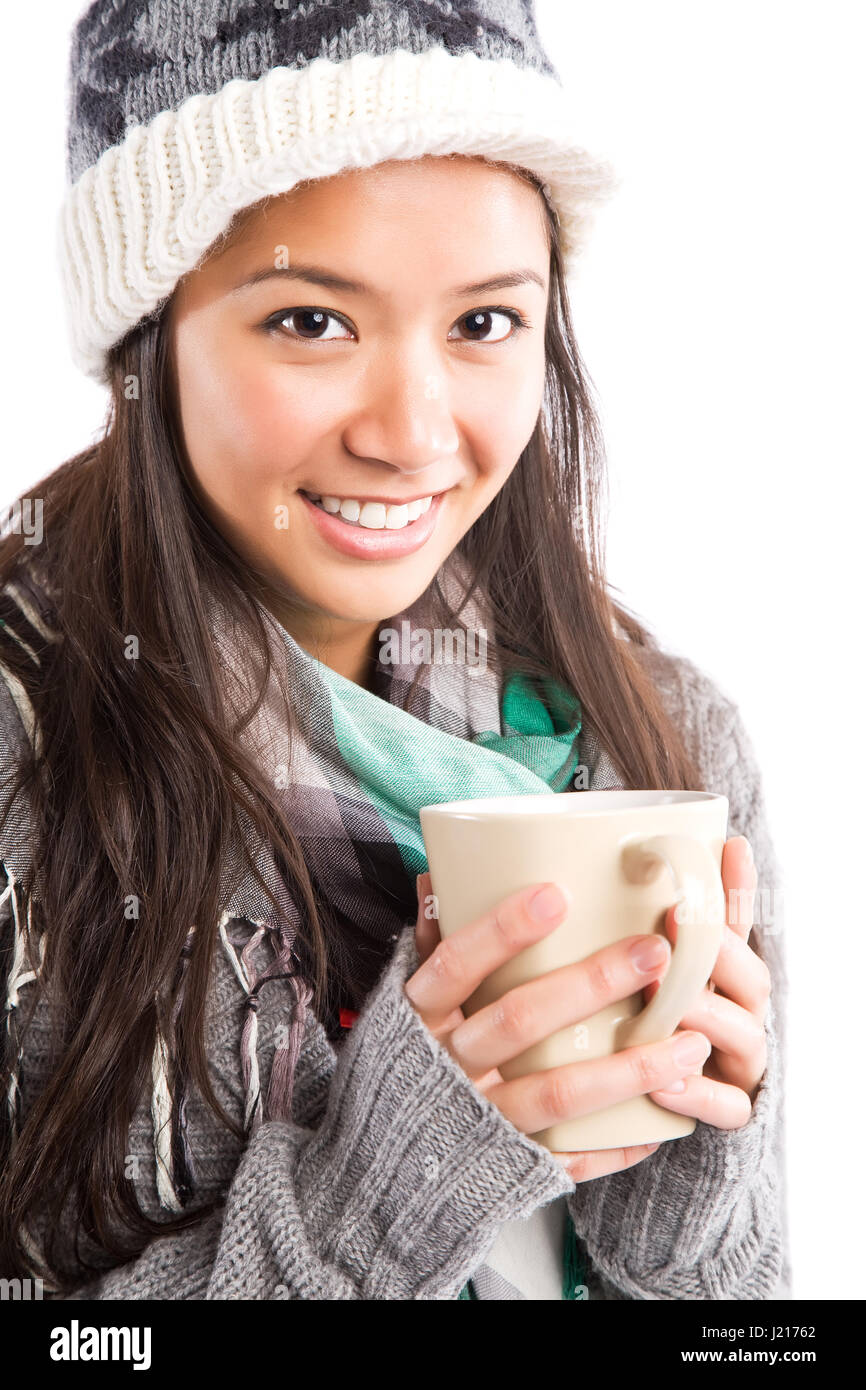 A shot of a happy beautiful asian woman drinking coffee Stock Photo