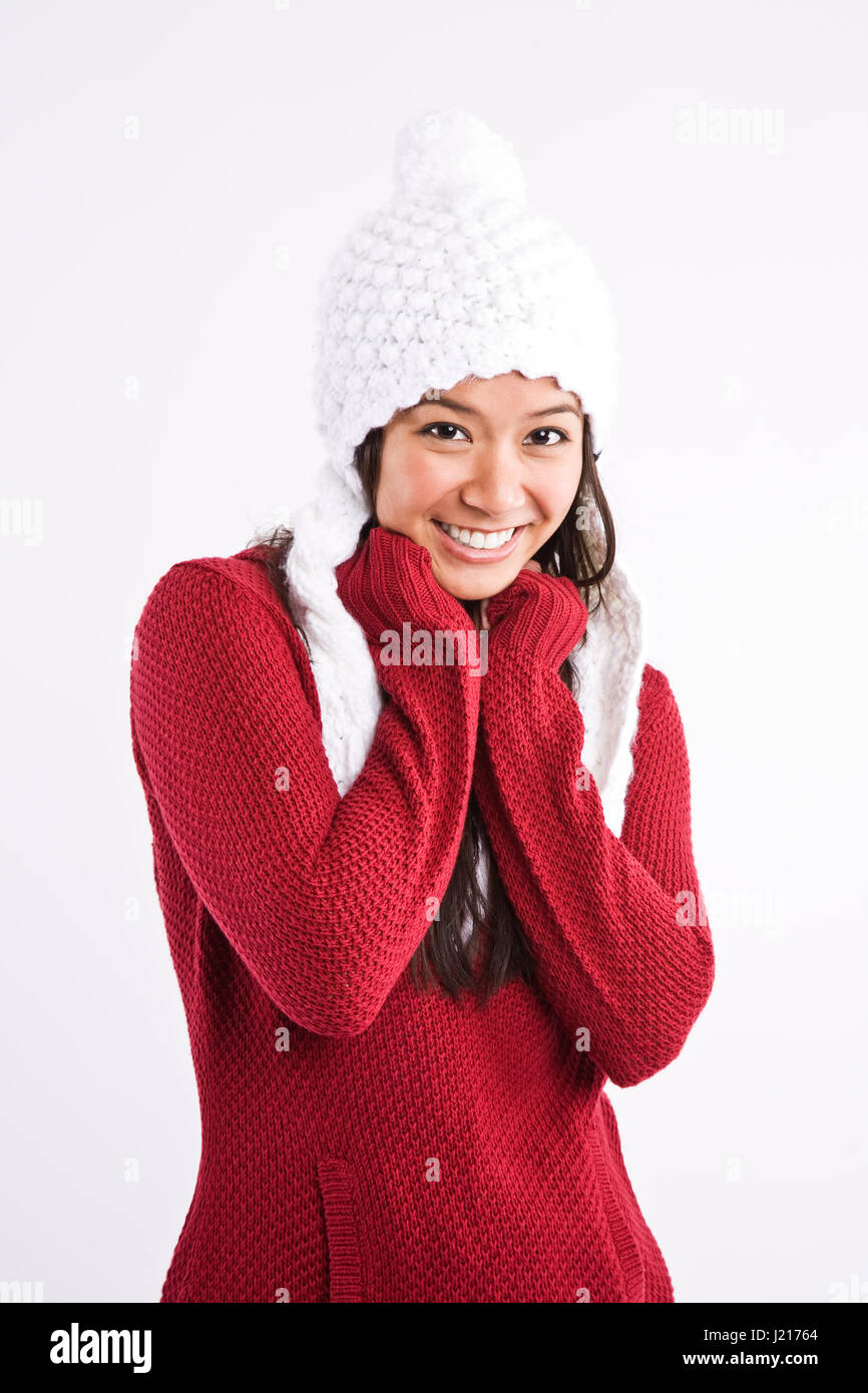 A shot of a happy beautiful asian woman in winter outfit Stock Photo