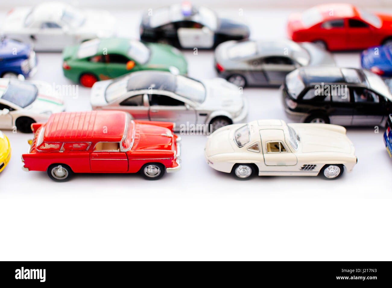 Toy colorful cars with top view on white background Stock Photo