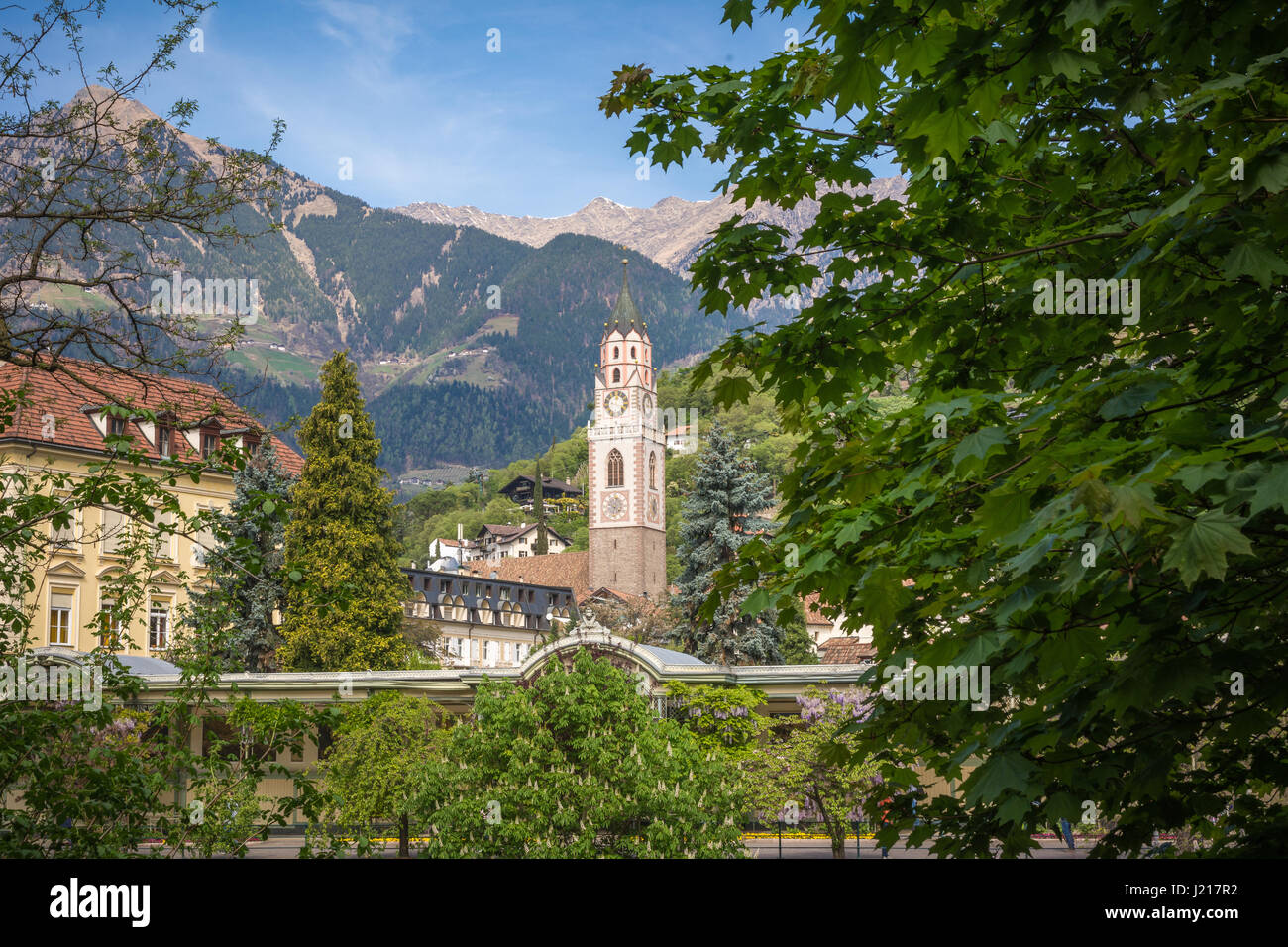 Bell Tower of the Cathedral of Merano - Italy / Detail of the bell tower of the Cathedral of St. Nicholas in Merano, Bolzano, south Tyrol, Italy Stock Photo