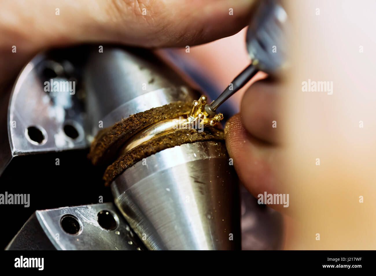 Ring being repaired , crafted by goldsmith Stock Photo Alamy