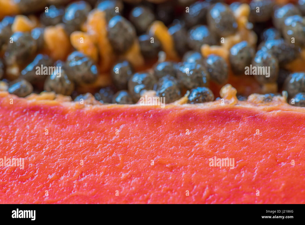 The texture of the cut, ripe and orange papaya Stock Photo