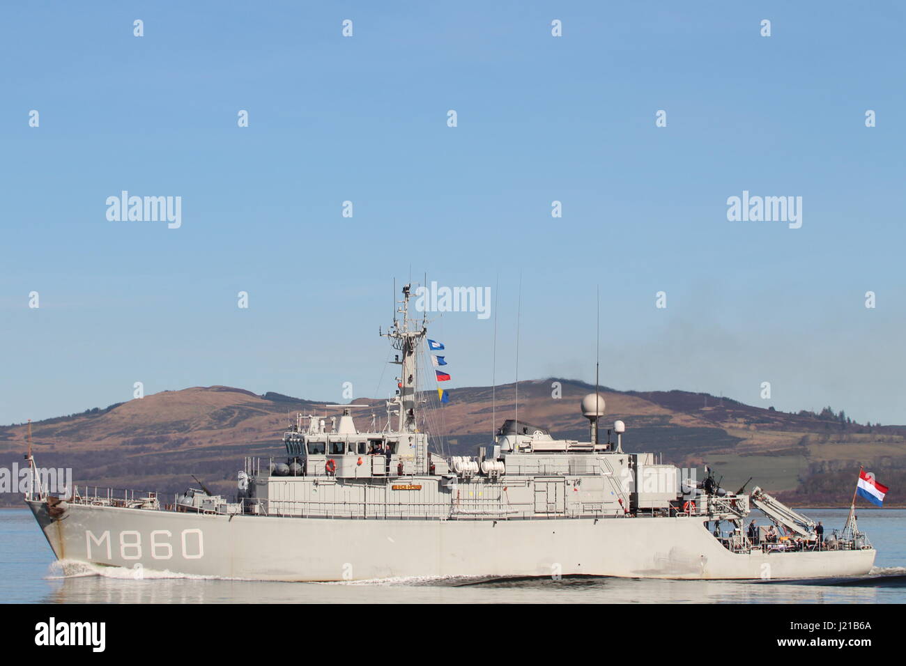 HNLMS Schiedam (M860), an Alkmaar-class minehunter of the Royal Netherlands Navy, passing Greenock at the start of Exercise joint Warrior 17-1. Stock Photo