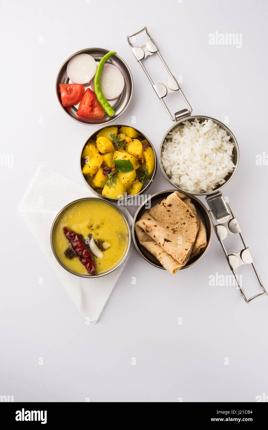 indian typical stainless steel lunch box or tiffin with north indian or