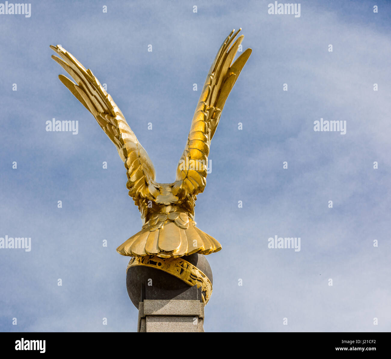 a fold winged eagle on a war memorials sculpture in a public park in London England, UK Stock Photo