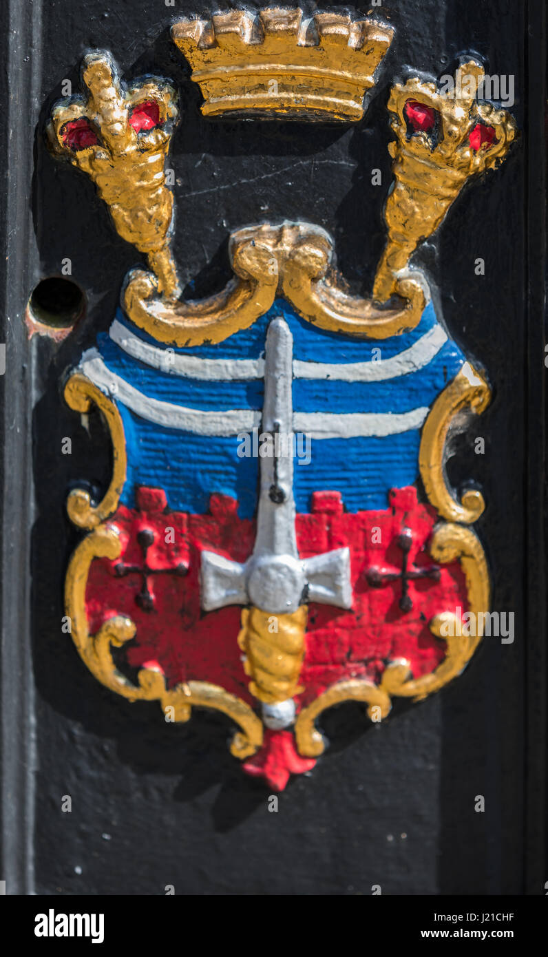 City of Bath coat of arms on a black traffic bollard in Bath, England, UK Stock Photo