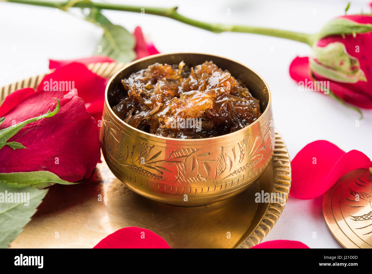 Gulkand, also known as Gulqand, is a sweet preserve of rose petals popular in India, usually used in chewing paan masala Stock Photo