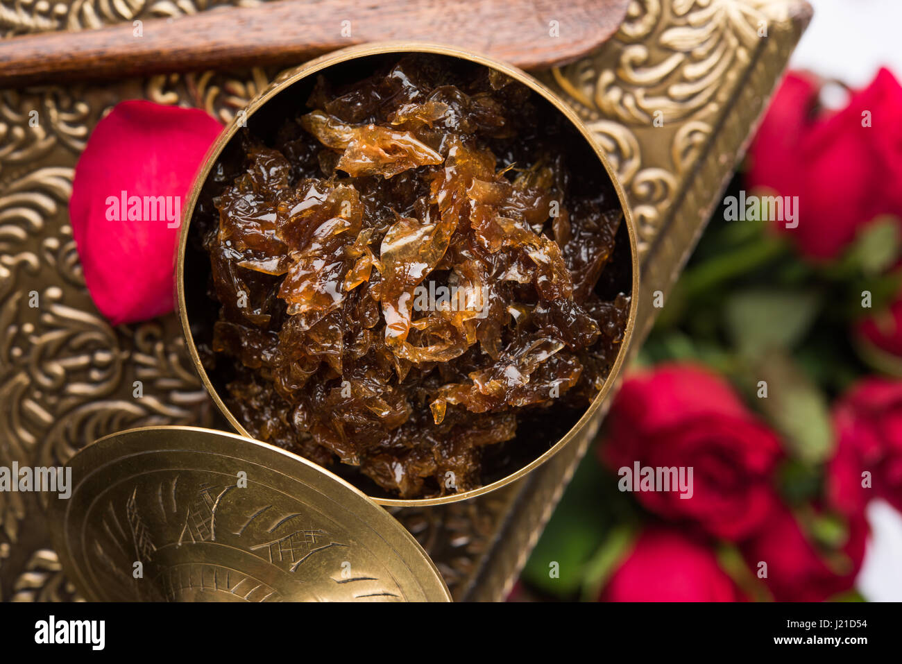 Gulkand, also known as Gulqand, is a sweet preserve of rose petals popular in India, usually used in chewing paan masala Stock Photo