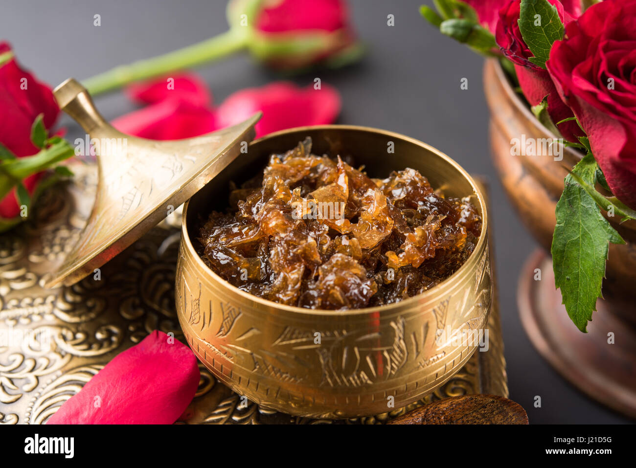 Gulkand, also known as Gulqand, is a sweet preserve of rose petals popular in India, usually used in chewing paan masala Stock Photo