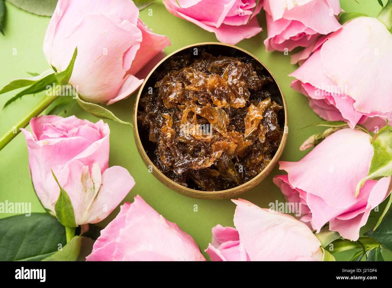 Gulkand, also known as Gulqand, is a sweet preserve of rose petals popular in India, usually used in chewing paan masala Stock Photo