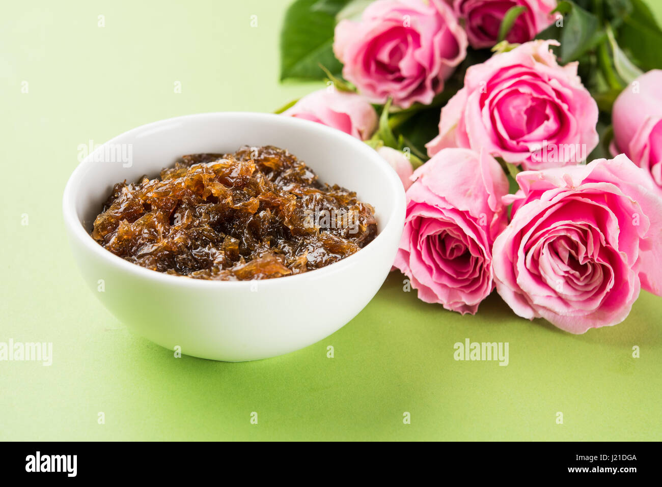 Gulkand, also known as Gulqand, is a sweet preserve of rose petals popular in India, usually used in chewing paan masala Stock Photo