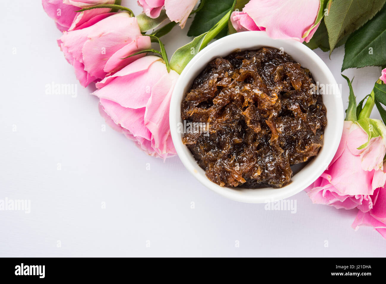 Gulkand, also known as Gulqand, is a sweet preserve of rose petals popular in India, usually used in chewing paan masala Stock Photo