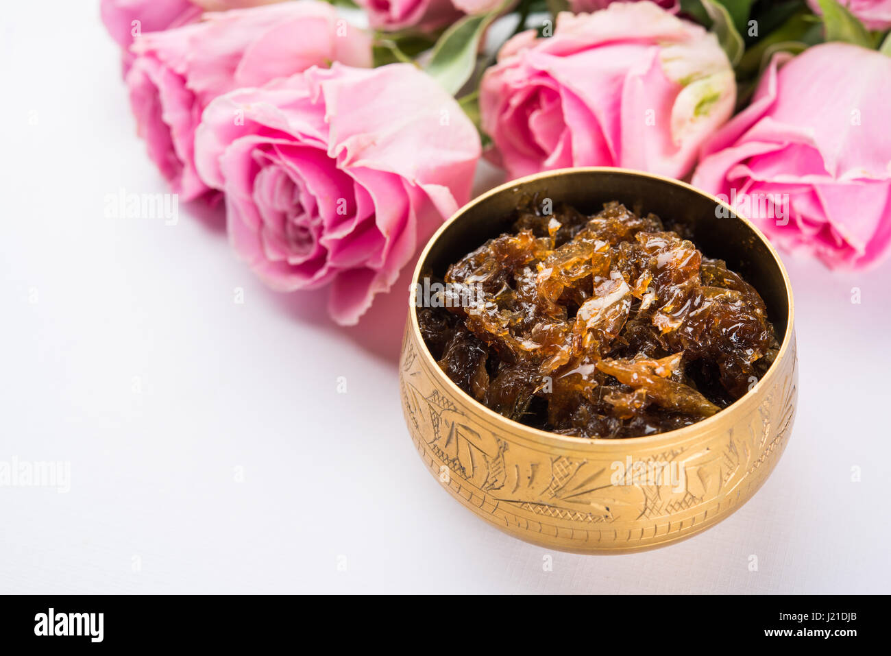 Gulkand, also known as Gulqand, is a sweet preserve of rose petals popular in India, usually used in chewing paan masala Stock Photo