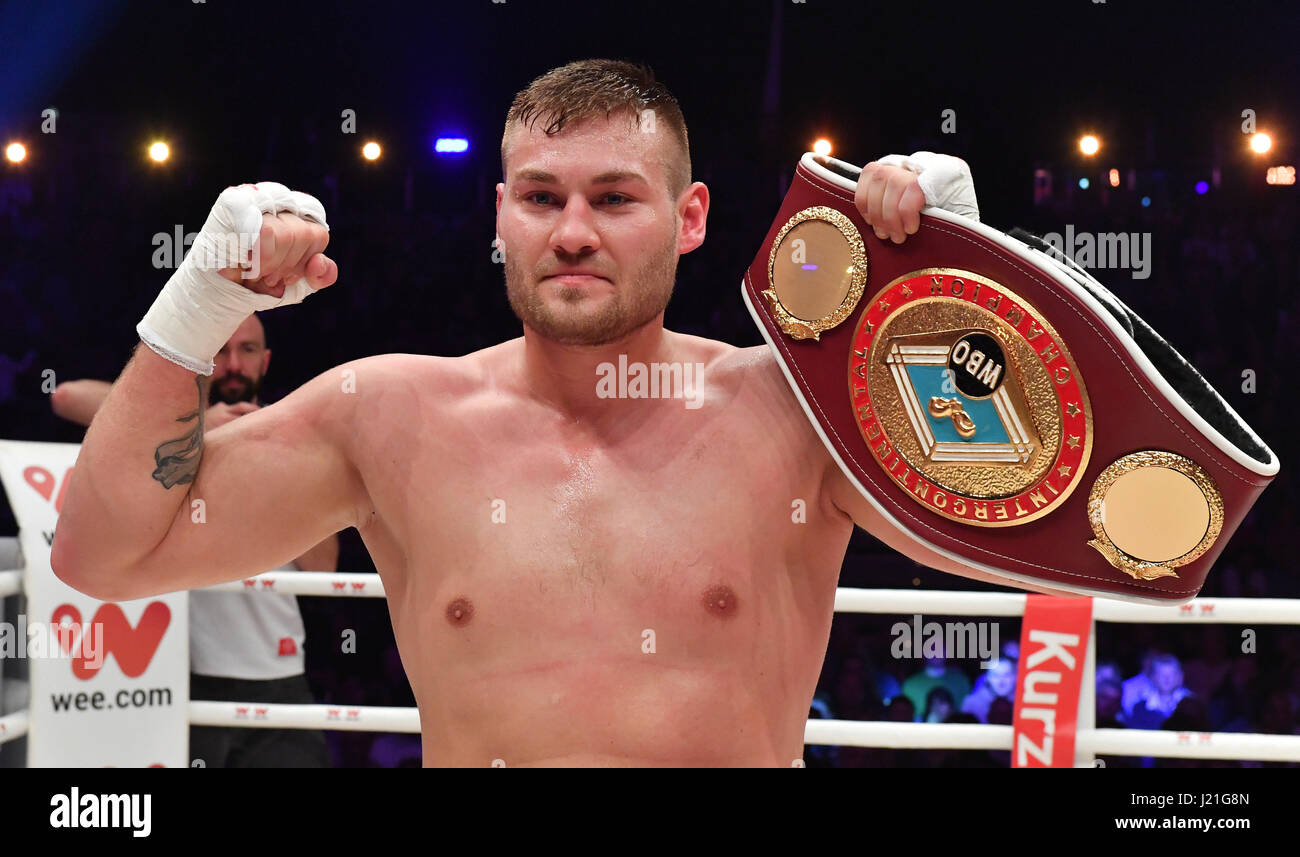 Tom Schwarz holds up the belt after the WBO Inter Conti Championships heavy  weight boxing fight between Schwarz (Germany) and Redzovic (Bosnia and  Herzegovina) at the fair in Erfurt, Germany, 22 April