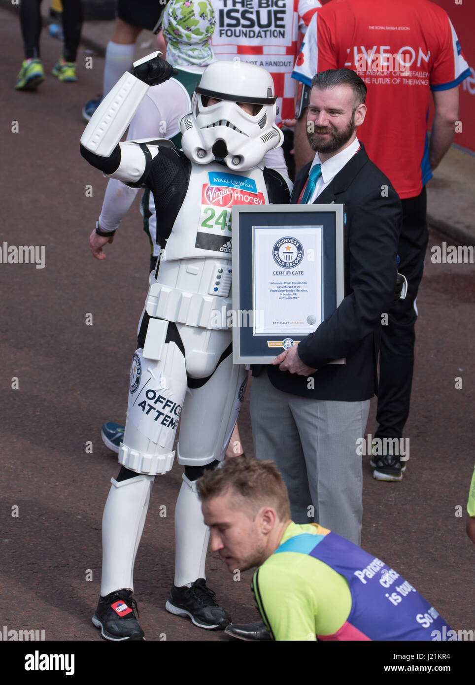 London, UK. 23rd April, 2017.A competitor dressed as a Storm Trooper enters the Guinness Book of Records as the fastest Storm Trooper at the Virgin Money Marathon Credit: Ian Davidson/Alamy Live News Stock Photo