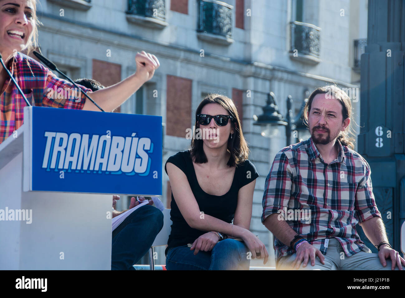 Madrid, Spain. 23rd April, 2017. meeting of podemos with pablo iglesias with el tramabus a blue bus that circulate around madrid city and in the bus its draw a different politic characters with charges of corruption Credit: Alberto Sibaja Ramírez/Alamy Live News Stock Photo
