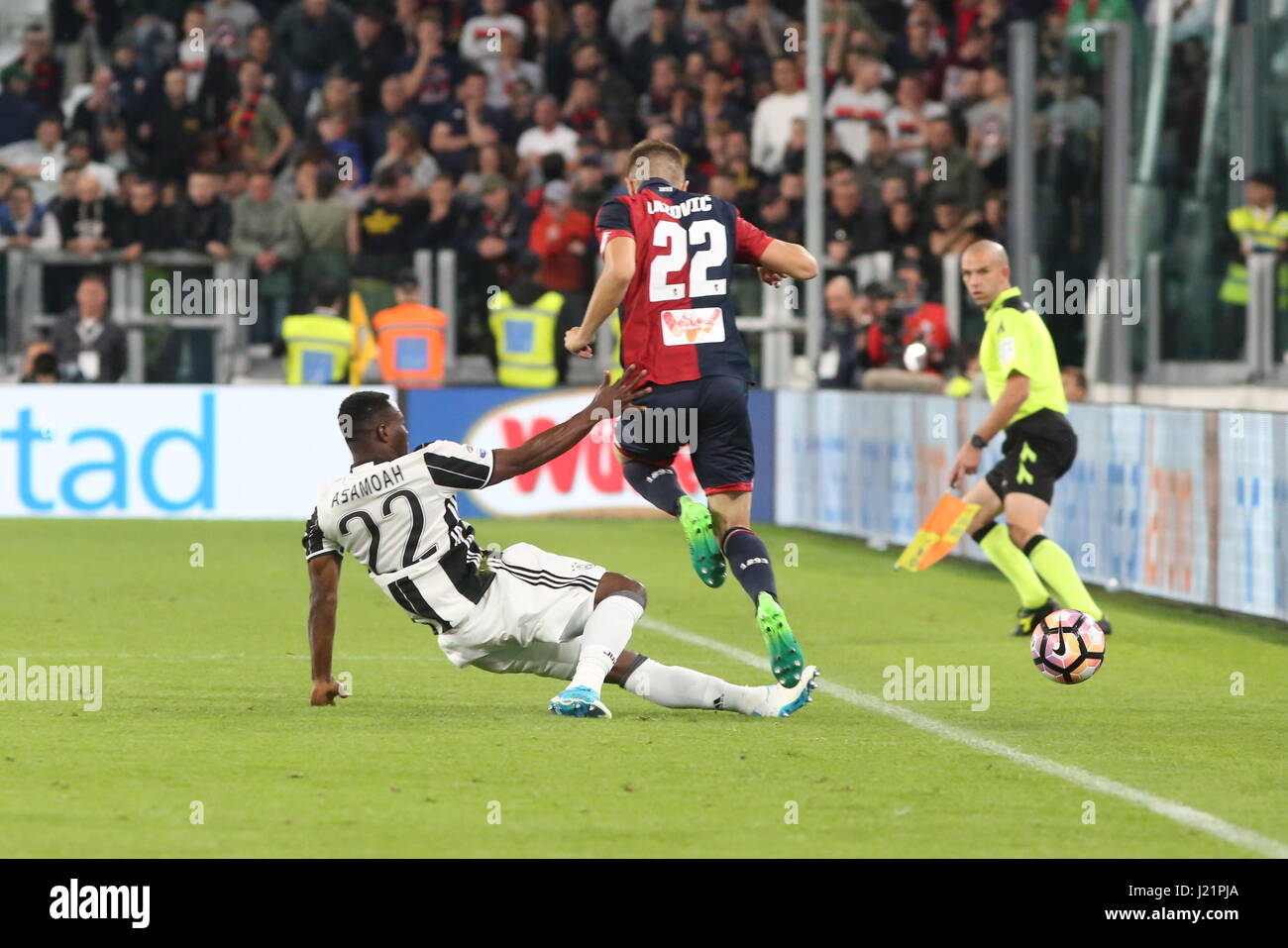 Turin, Italy. 23rd Apr, 2017. Kwadwo Asamoah (Juventus FC) and Darko Lazovic (Genoa FC) compete for the ball during the Serie A football match between Juventus FC and Genoa FC at Juventus Stadium on April 23, 2017 in Turin, Italy. Credit: Massimiliano Ferraro/Alamy Live News Stock Photo