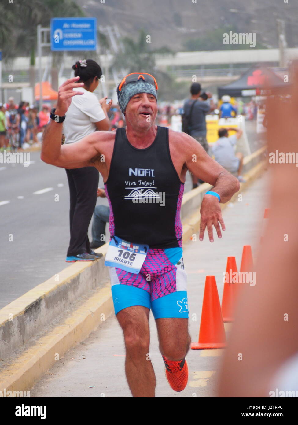 Gustavo Iriarte (Argentina) running. Over 1653 athletes ran in the IRONMAN 70.3 Peru race at Agua Dulce beach in Chorrillos town, Lima. Stock Photo