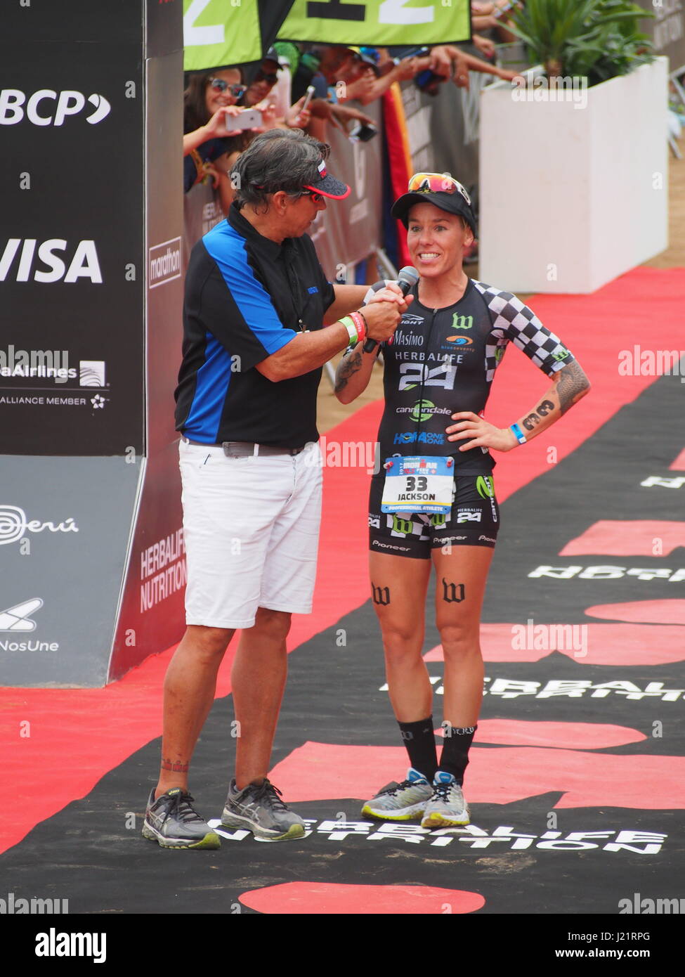 Heather Jackson (USA) winner of women category on finish line. Over